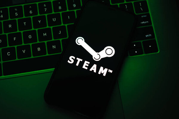 Steam logo on the smartphone screen. 