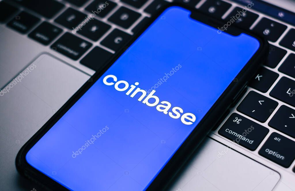 Coinbase logo on smartphone screen.