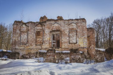 Olgovo, Dmitrov region, Russia - March 28, 2021: Part of the abandoned facade of the Apraksin Manor. Classicism of the late 18th century. Object of the cultural heritage of the peoples of the Russian Federation