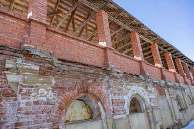 Olgovo, Dmitrov region, Russia - March 28, 2021: Part of the abandoned facade of the Apraksin Manor. Classicism of the late 18th century. Object of the cultural heritage of the peoples of the Russian Federation