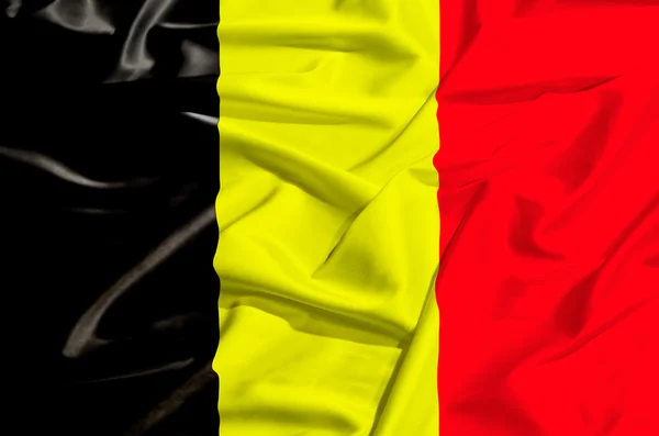 België vlag op een zijden gordijn — Stockfoto