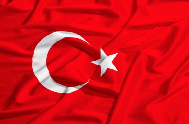 İpek örtü sallayarak üzerinde Türkiye bayrağı