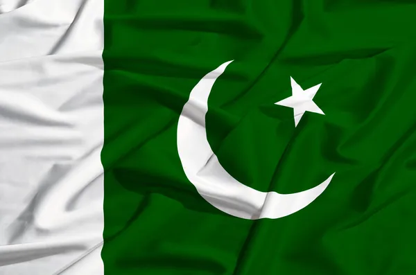 Pakistan flag on a silk drape waving — Stock Photo, Image
