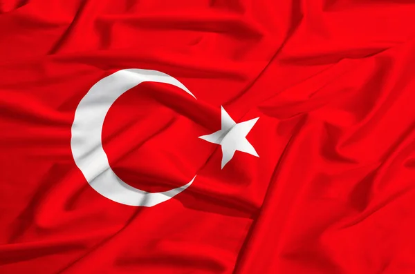 Drapeau de la Turquie sur un rideau de soie agitant — Photo