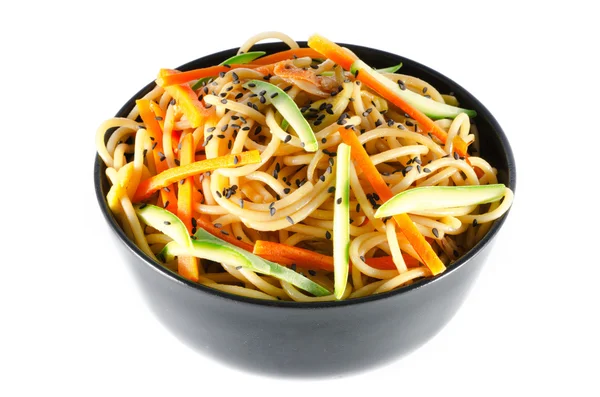 Serving of spaghetti with carrots and zucchini and soy sauce and — Stock Photo, Image