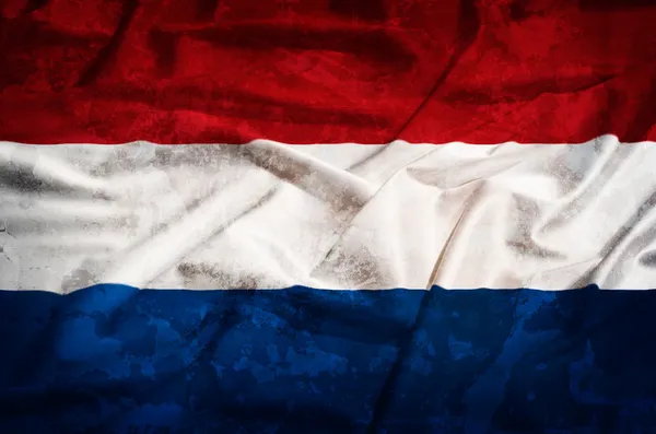 Netherland grunge flag on a silk drape — Stock Photo, Image