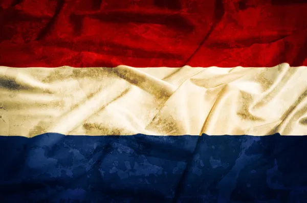 荷兰 grunge 旗对真丝织物的悬垂 — 图库照片