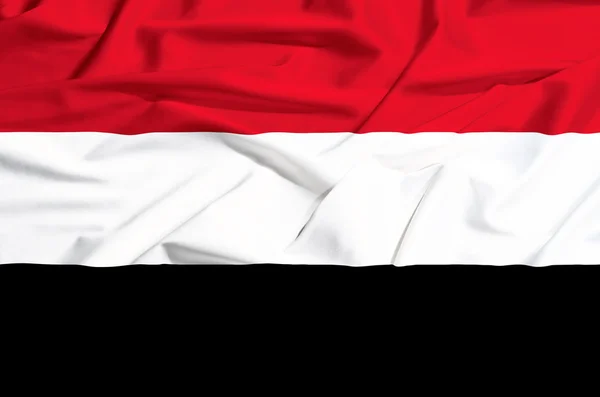 Bandera de Yemen sobre una cortina de seda ondeando — Foto de Stock