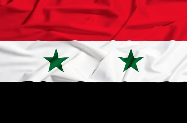 Bandera de Siria sobre una cortina de seda ondeando — Foto de Stock