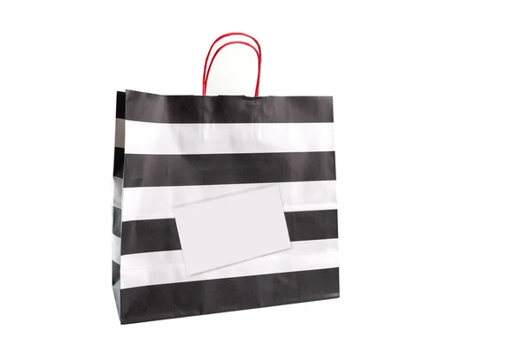 Ασπρόμαυρη ριγέ χάρτινη τσάντα για ψώνια, απομονωμένη — Φωτογραφία Αρχείου