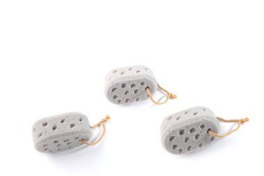 set of grey shower sponges isolated on white, washing body or face concept