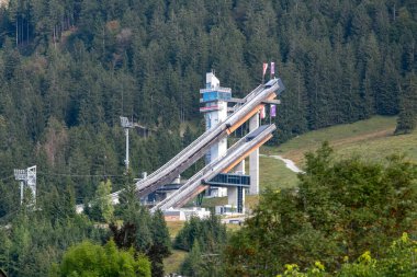 Oberstdorf  -View to ski-jump arena , which is in wintertime the first in the tournment, Bavaria, Germany, 21.09.2021 clipart