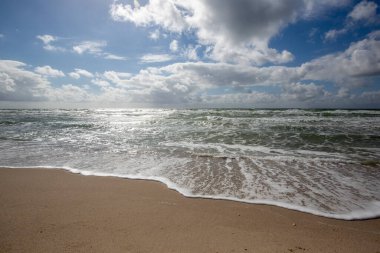 Sylt- View  to waves Sylt, at Wenningstedt Beach, Germany, 13.06.2022