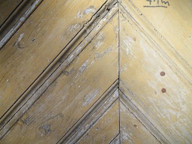 Sarı boyanmış tahtalardan soyut desenli doğal arka plan, seçici odaklanma. Yüksek kalite fotoğraf