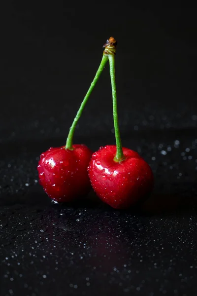 Close Photo Pair Fresh Red Cherries Water Drops Black Background — Stock Photo, Image