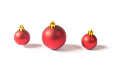 Red  christmas baubles with pine branches isolated on white background. Christmas decoration concept