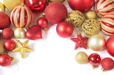 Bunch of red and golden christmas baubles isolated on white background. Christmas decoration concept