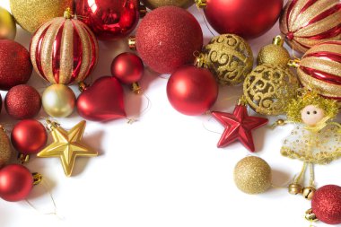Bunch of red and golden christmas baubles isolated on white background. Christmas decoration concept