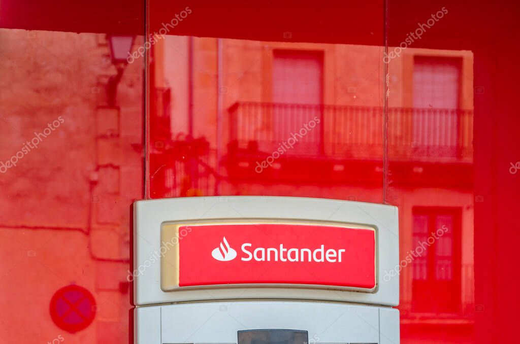SEPULVEDA, SPAIN - SEPTEMBER 12, 2021: Santander bank branch office in Sepulveda, a medieval village in Castile and Leon, Spain. Santander is a Spanish bank founded in 1857
