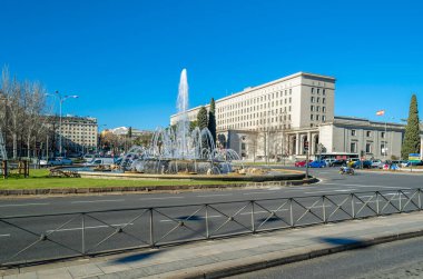 MADRID, SPAIN - JANUARY 12, 2022: Urban scene, view of Paseo de la Castellana in the Nuevos Ministeios area. Paseo de la Castellana is a major street in Madrid, Spain, cutting across the city from south to north