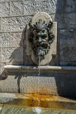 Street fountain in the old town of Geneva, Switzerland