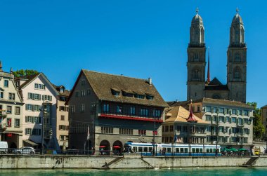 ZURICH, SWITZERLAND - SEPTEMBER 3, 2013: View of Zurich old town on the banks of the Limmat river