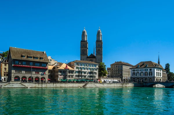 ZURICH, SWITZERLAND - SEPTEMBER 3, 2013: View of Zurich old town on the banks of the Limmat river