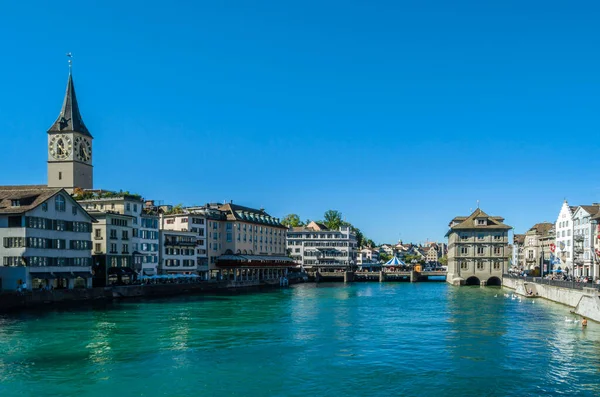 ZURICH, SWITZERLAND - SEPTEMBER 3, 2013: View of Zurich old town on the banks of the Limmat river