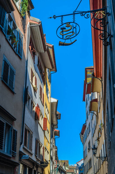 ZURICH, SWITZERLAND - SEPTEMBER 3, 2013: View of commercial colorful streets in the old town of Zurich, Switzerland