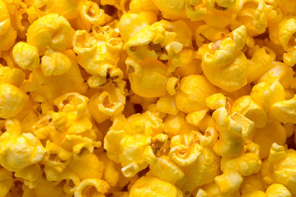Hromada Másla Popcorn Pozadí Zavřít — Stock fotografie