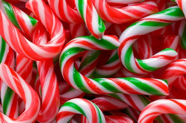 Small Candy Cane Pile Background Close — стоковое фото