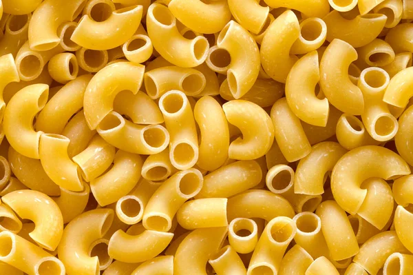 Gomito Secco Pasta Maccheroni Tagliatelle Pile Sfondo — Foto Stock