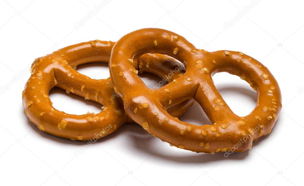 Two Large Pretzels Cut Out on White.