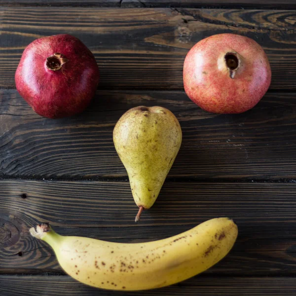 Smiling Face Fruits Pomegranates Pear Banana Table Wooden Planks — Stock Photo, Image
