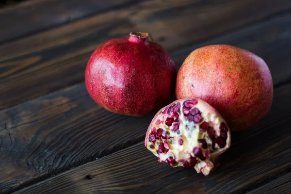 Red Pomegranates Table Wooden Planks — Stock Photo, Image