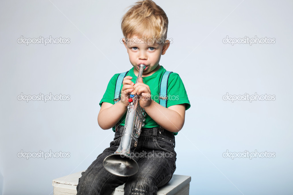 Kid Blowing Trumpet