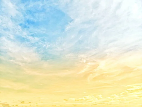 blue sky with clouds.Background of bright evening sky and background of thin clouds, sky clouds, blue sky and white clouds floating in the sky on a clear day with warm sunlight.