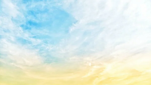 blue sky with clouds.Background of bright evening sky and background of thin clouds, sky clouds, blue sky and white clouds floating in the sky on a clear day with warm sunlight.