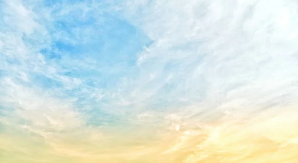blue sky with clouds.Background of bright evening sky and background of thin clouds, sky clouds, blue sky and white clouds floating in the sky on a clear day with warm sunlight.