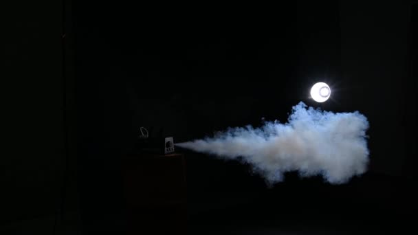 Smoke Generator Emits Smoke Illuminated White Smoke Moves Black Background — Stockvideo