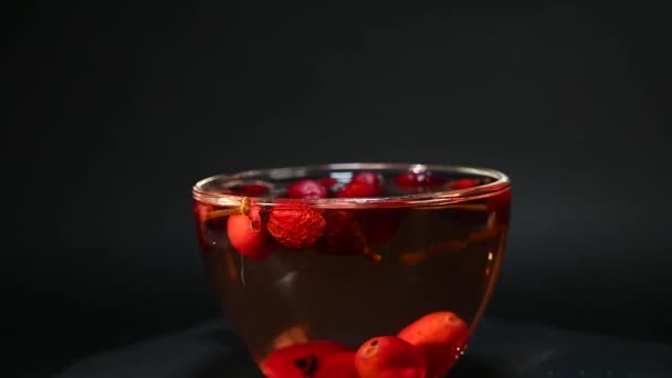 Cup Rosehip Tea Spins Circle Rotating Platform — Stock Video