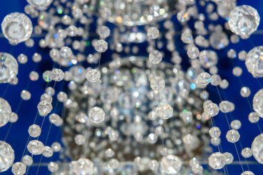 Chandelier with sparkling crystal ball.