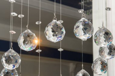 Chandelier with sparkling crystal ball.