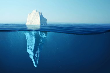Iceberg in clear blue water and hidden danger under water. Iceberg - Hidden Danger And Global Warming Concept. Floating ice in ocean. Copyspace for text and design clipart