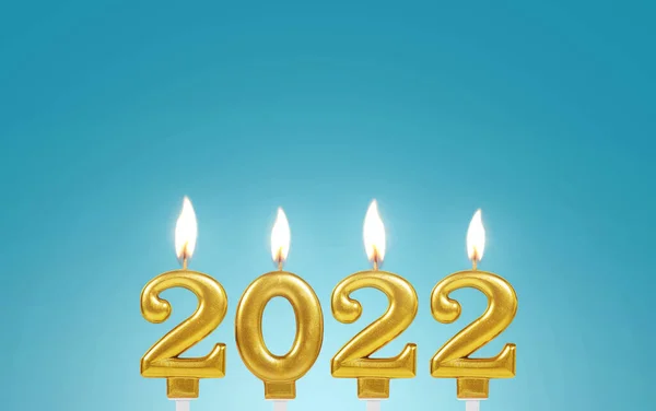 Véspera Ano Novo 2022 Velas Ouro 2022 Queimando Fundo Azul — Fotografia de Stock