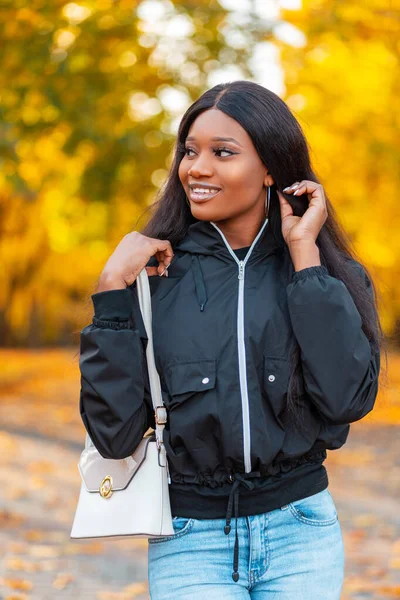 Satisfied Beautiful Young Smiling Black Woman Fashionable Jacket Blue Jeans — Stock Photo, Image