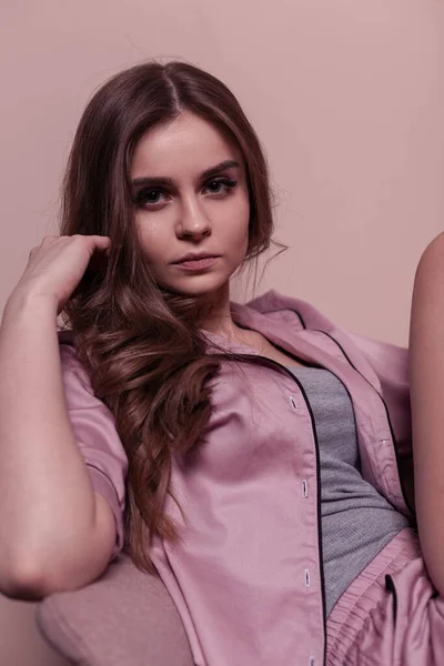 Pretty Young Woman Pink Nightwear Pajamas Sits Chair Pink Wall — Fotografia de Stock