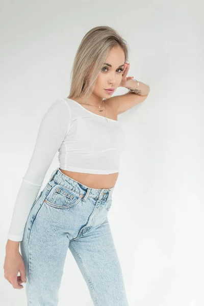 Pretty Young Blonde Girl White Shirt High Waist Blue Jeans — стоковое фото
