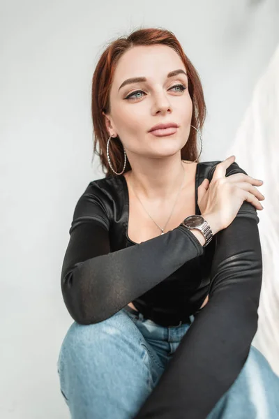 Fashion Young Woman Makeup Stylish Black Shirt Blue Jeans Sits — Fotografia de Stock