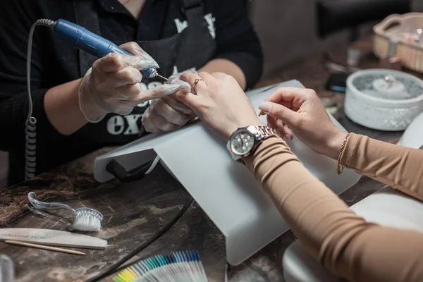 Woman Cares Her Hands Makes Manicure Professional Beauty Studio Female — Fotografia de Stock